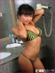 Облитое маслом тело грудастой азиатки в бикини, фото 1